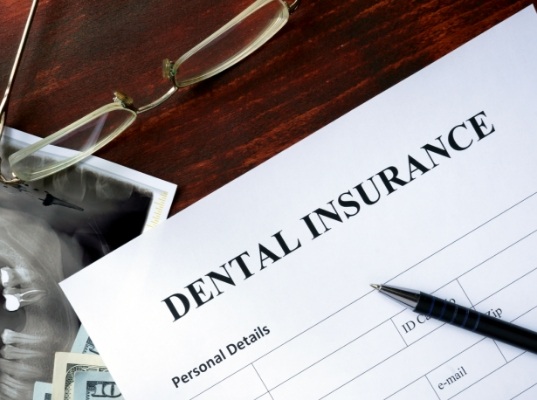 Dental insurance form on desk