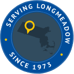 Seal with shape of Massachusetts and text that says Serving Longmeadow Since 1973