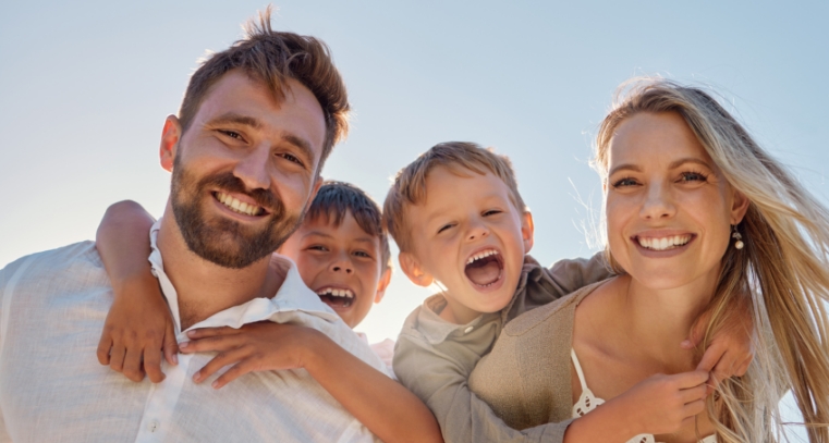 Smiling Longmeadow Massachusetts dentists and team at Flagship Dental Group