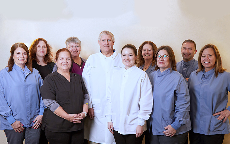 Smiling Longmeadow Massachusetts dentists and team at Flagship Dental Group