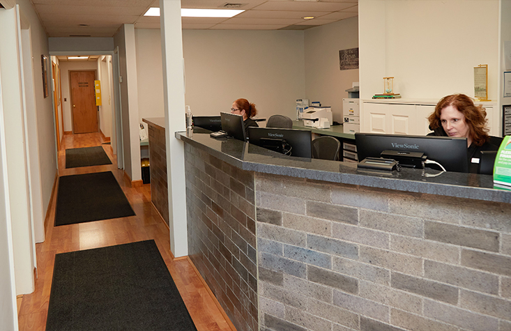 Front desk and hallway in Longmeadow dental office