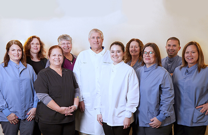 Smiling Longmeadow dental team at Flagship Dental Group